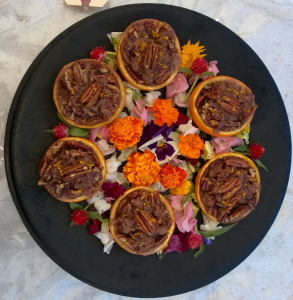 Orange Bourbon Pecan "Pies" in Orange Halves
